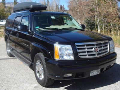 Fleet limo with roof rack and lock box, 4wheel drive SUV Cadillac Escalade