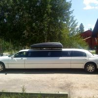 Large stretch white Stagecoach Limo