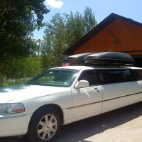 Large stretch white Stagecoach Limo